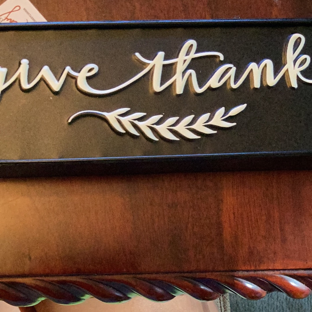 Metal sign give thanks